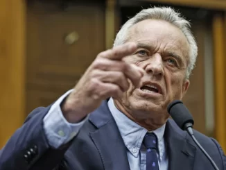 RFK angrily brandishing a finger as he gives a speech this past July.