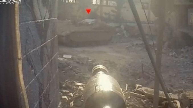 Still image of a first-person view of an RPG pointed at a tank which has the red triangle mark placed over it