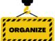 A cartoon image of a crane holding a construction sign that says ORGANIZE, followed by the words "within the DSA!"